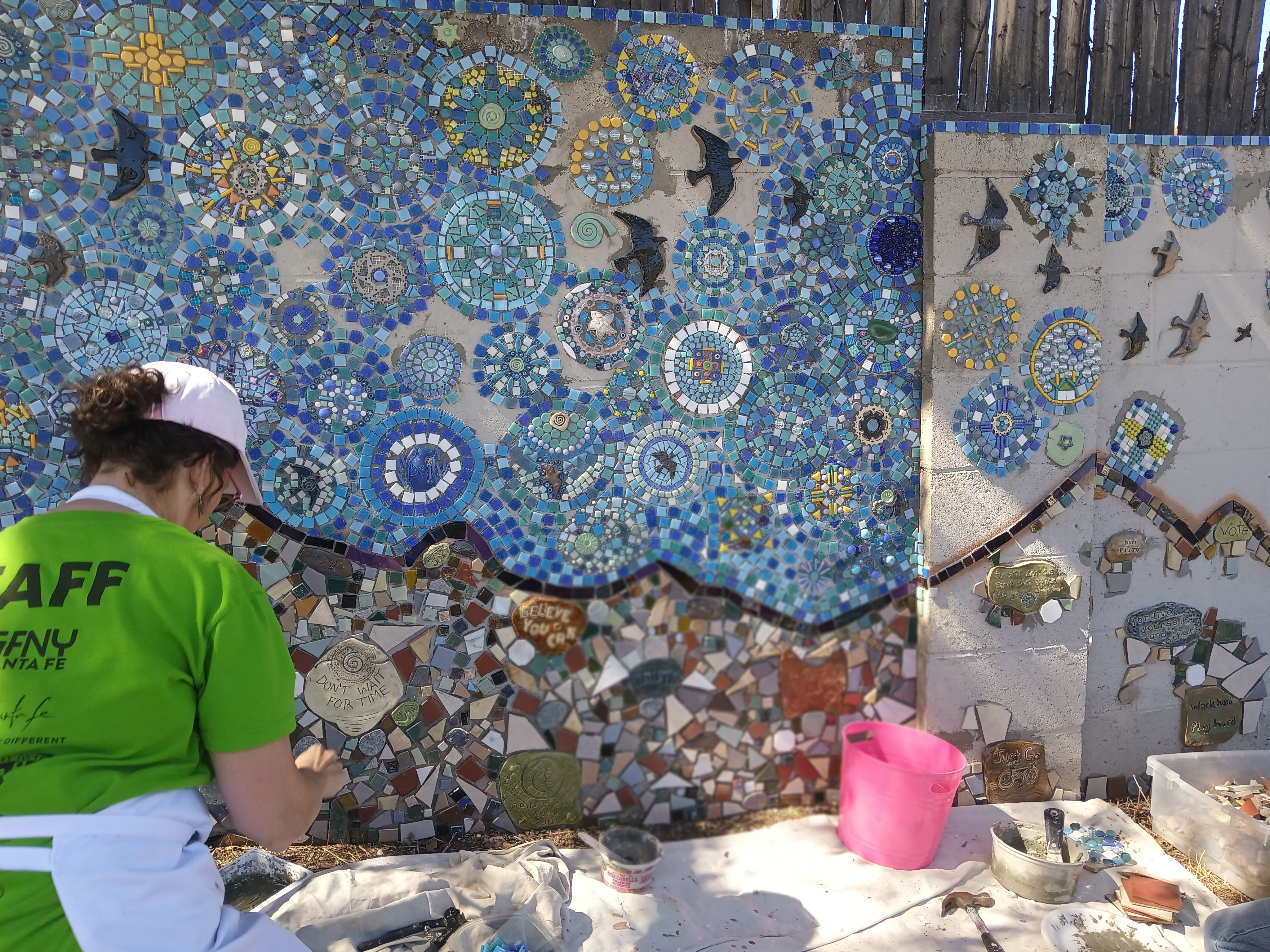 volunteer working on the wall, October 2022