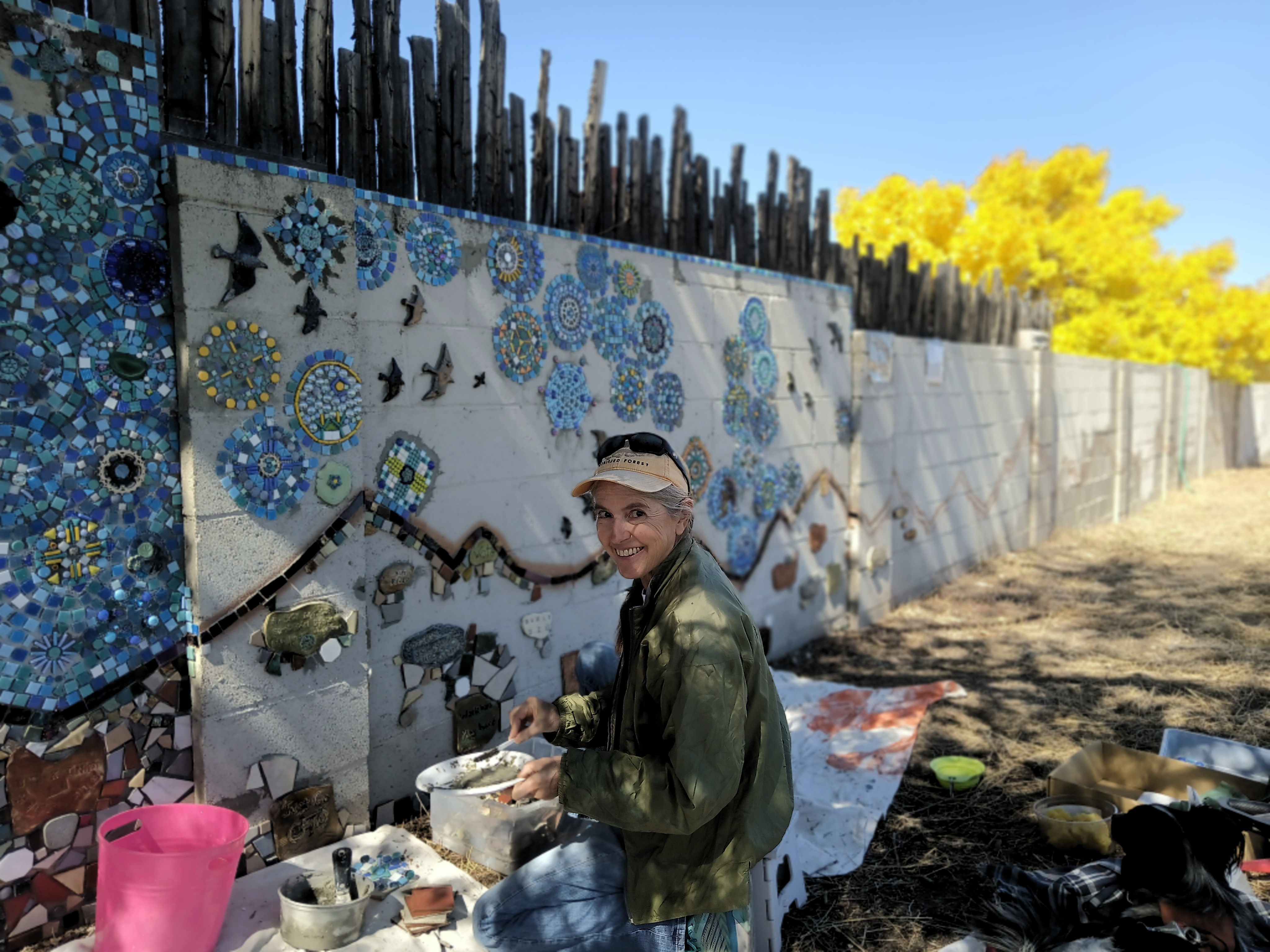 volunteer working on the wall, October 2022