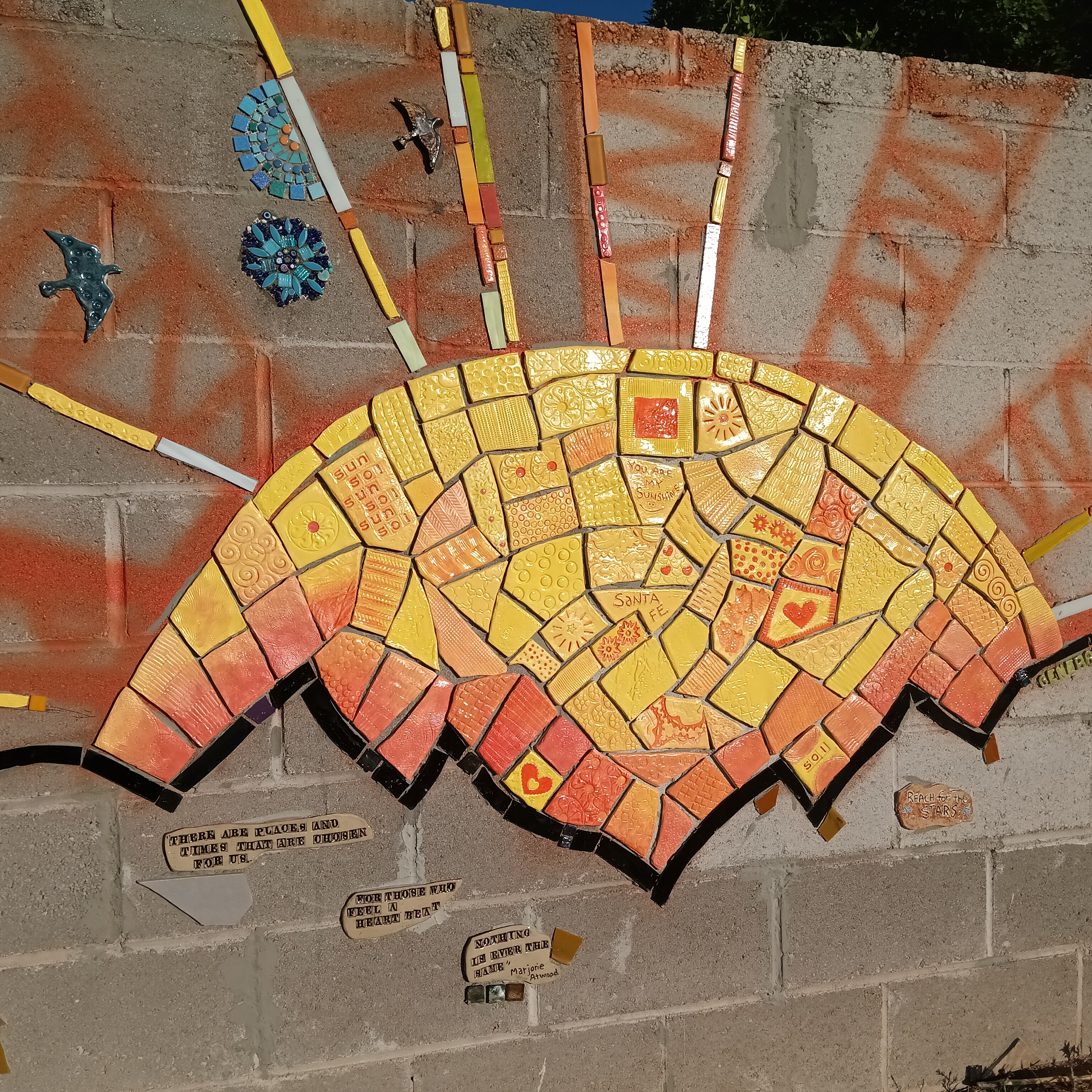 the rising sun on the wall