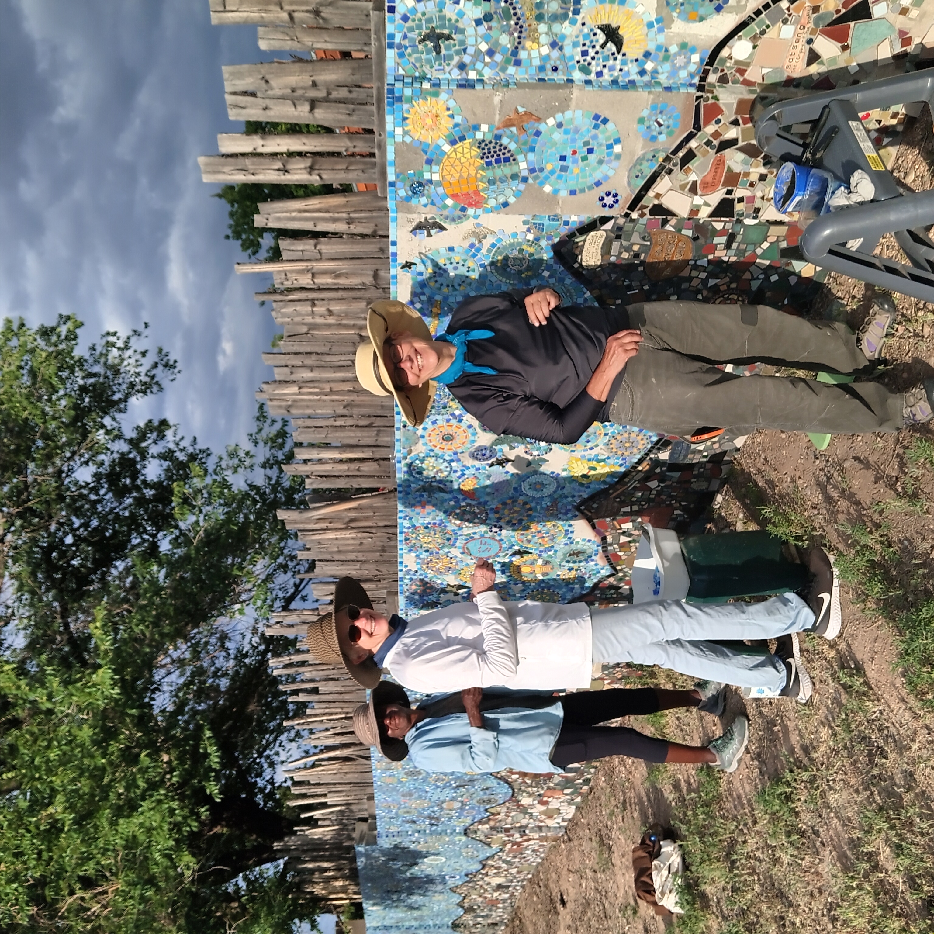 volunteers working on the wall, July 2023