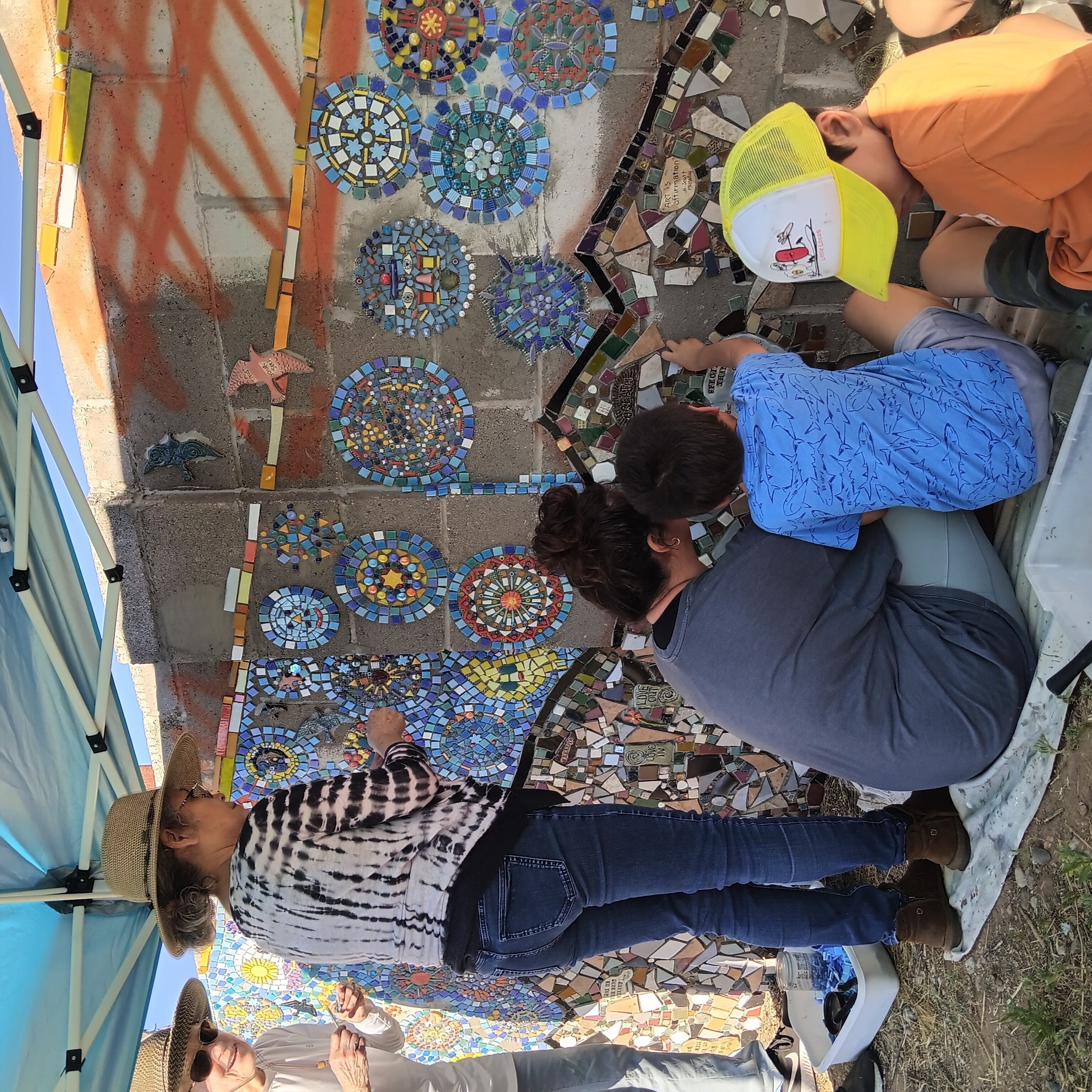 volunteers working on the wall, July 2023
