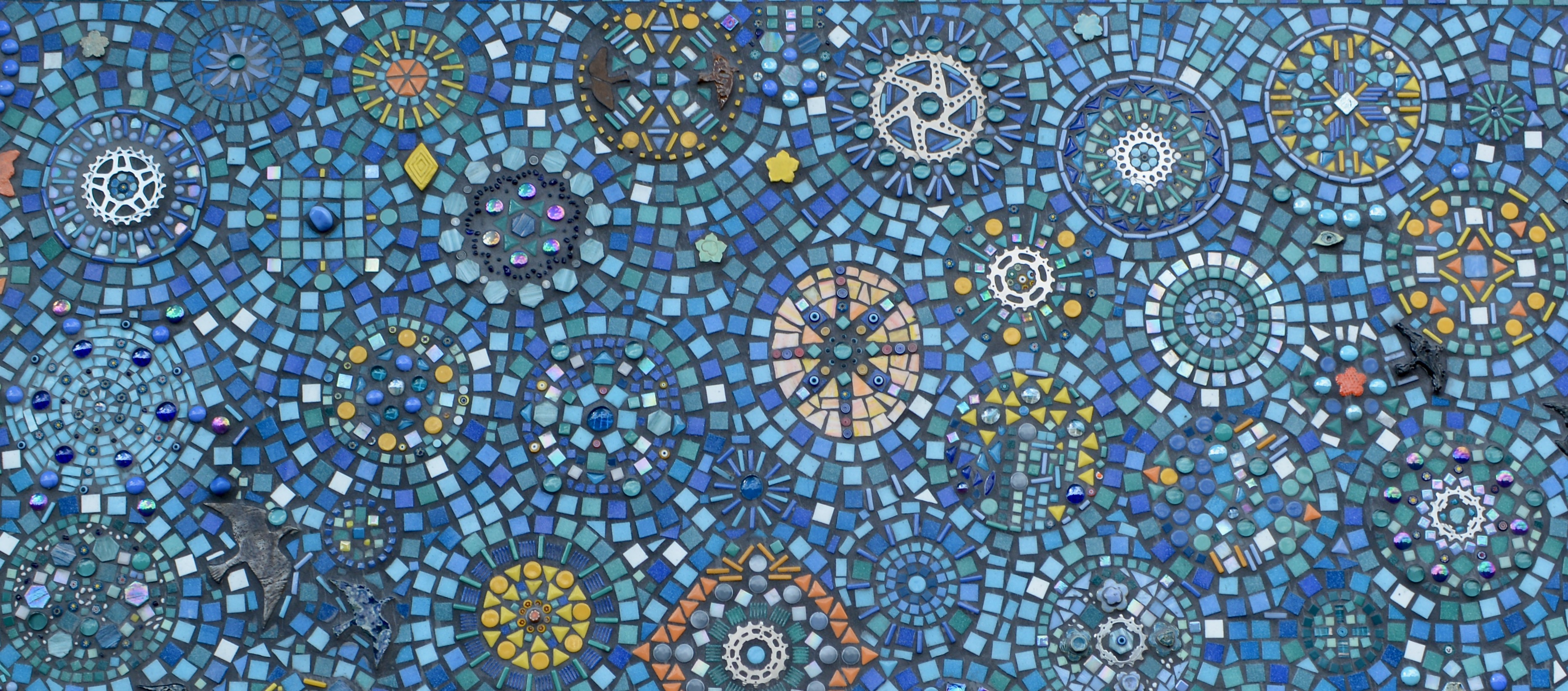 a photo of a mandala-filled section of the Generations mural, by Daryl Black